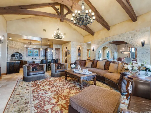 a kitchen with stainless steel appliances granite countertop a stove and a sink