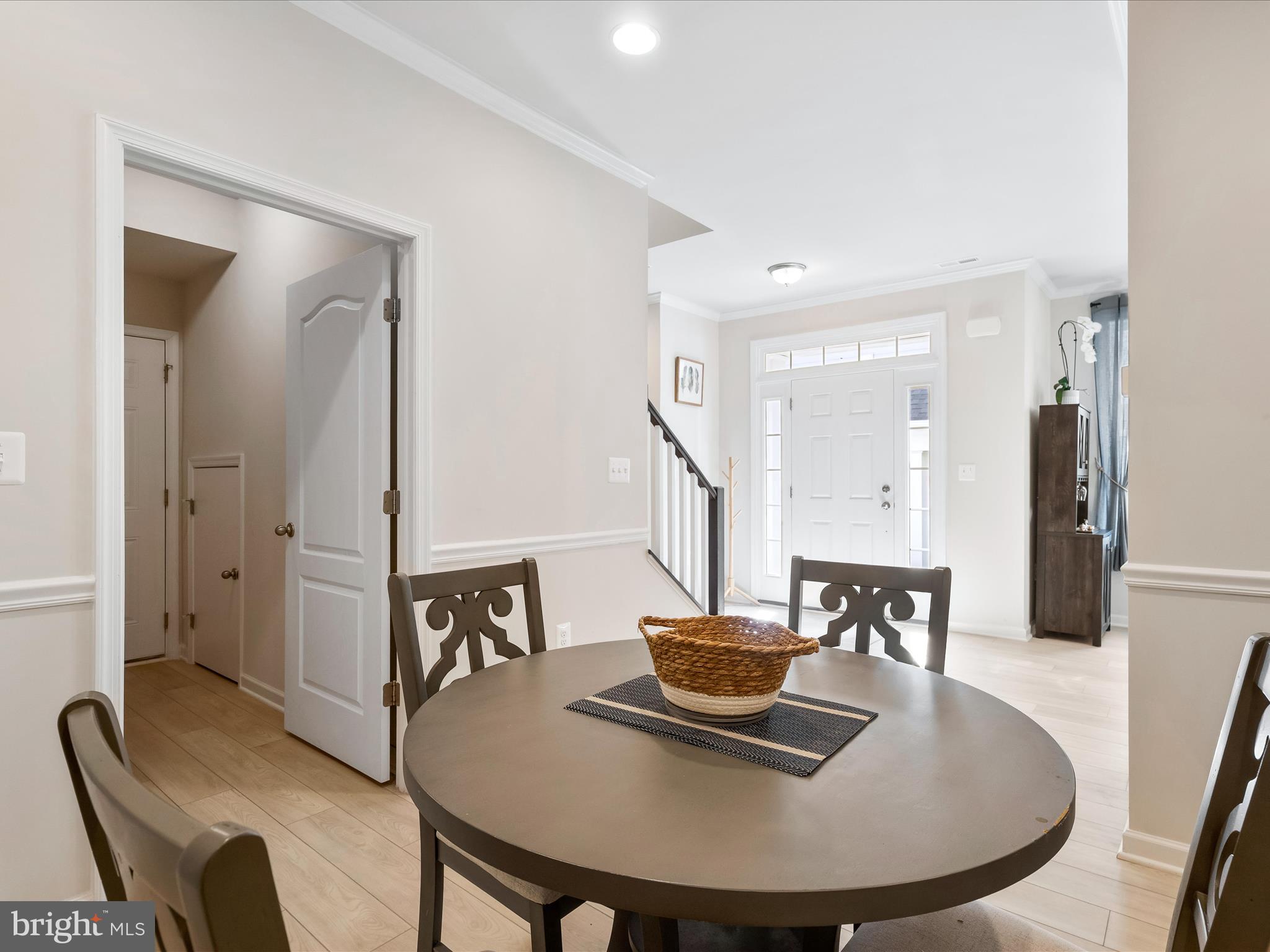 13444 Petrel Street Clarksburg, MD 20871 - Photo 13 of 45 a view of a dining room with furniture