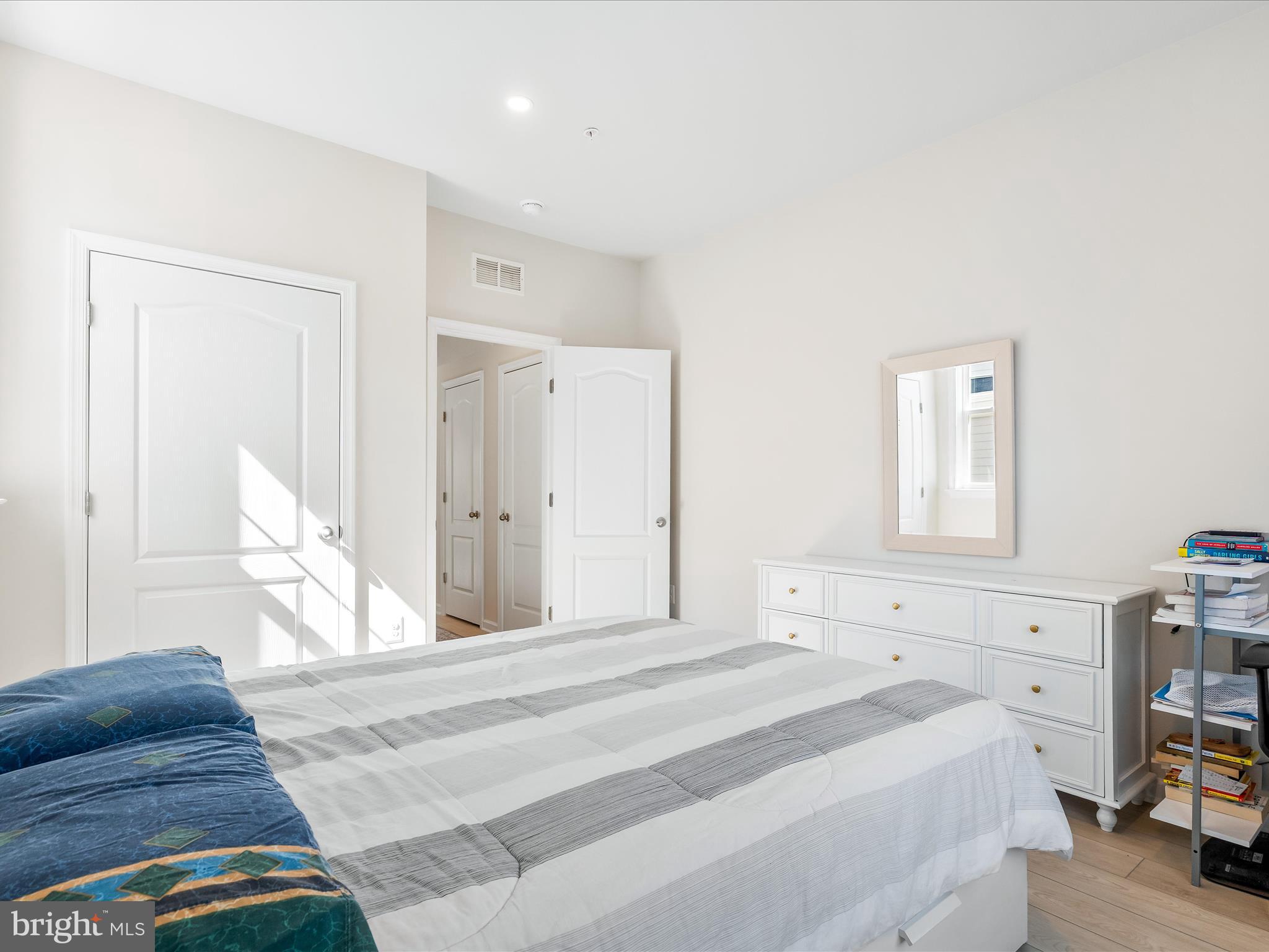 13444 Petrel Street Clarksburg, MD 20871 - Photo 18 of 45 a bedroom with a bed and cabinets