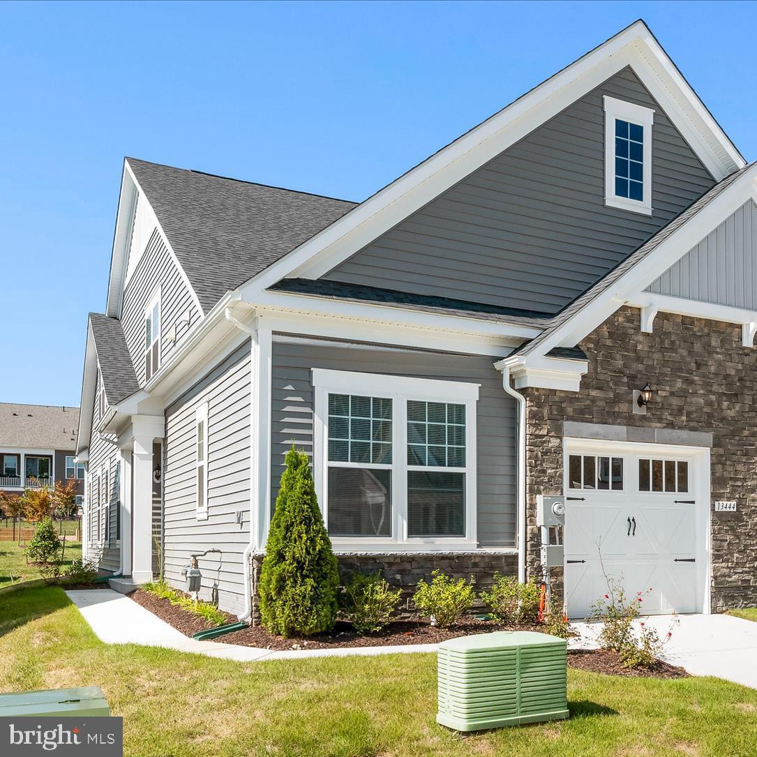 13444 Petrel Street Clarksburg, MD 20871 - Photo 2 of 45 a front view of a house with swimming pool