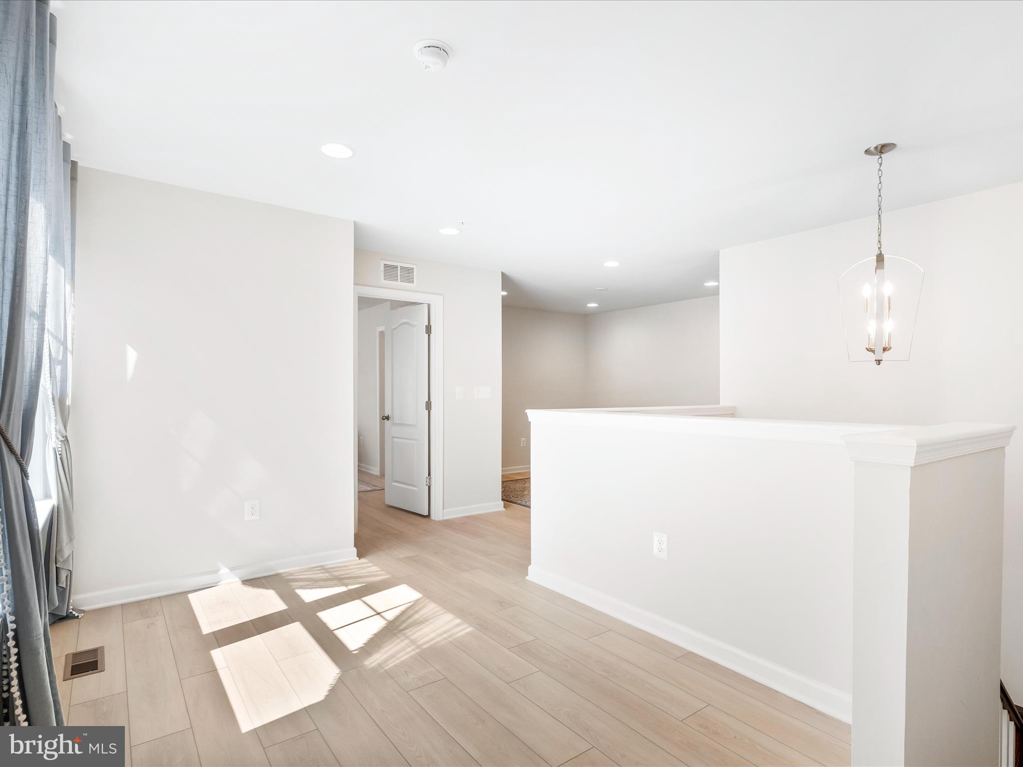 13444 Petrel Street Clarksburg, MD 20871 - Photo 22 of 45 a view of a living room with a sink