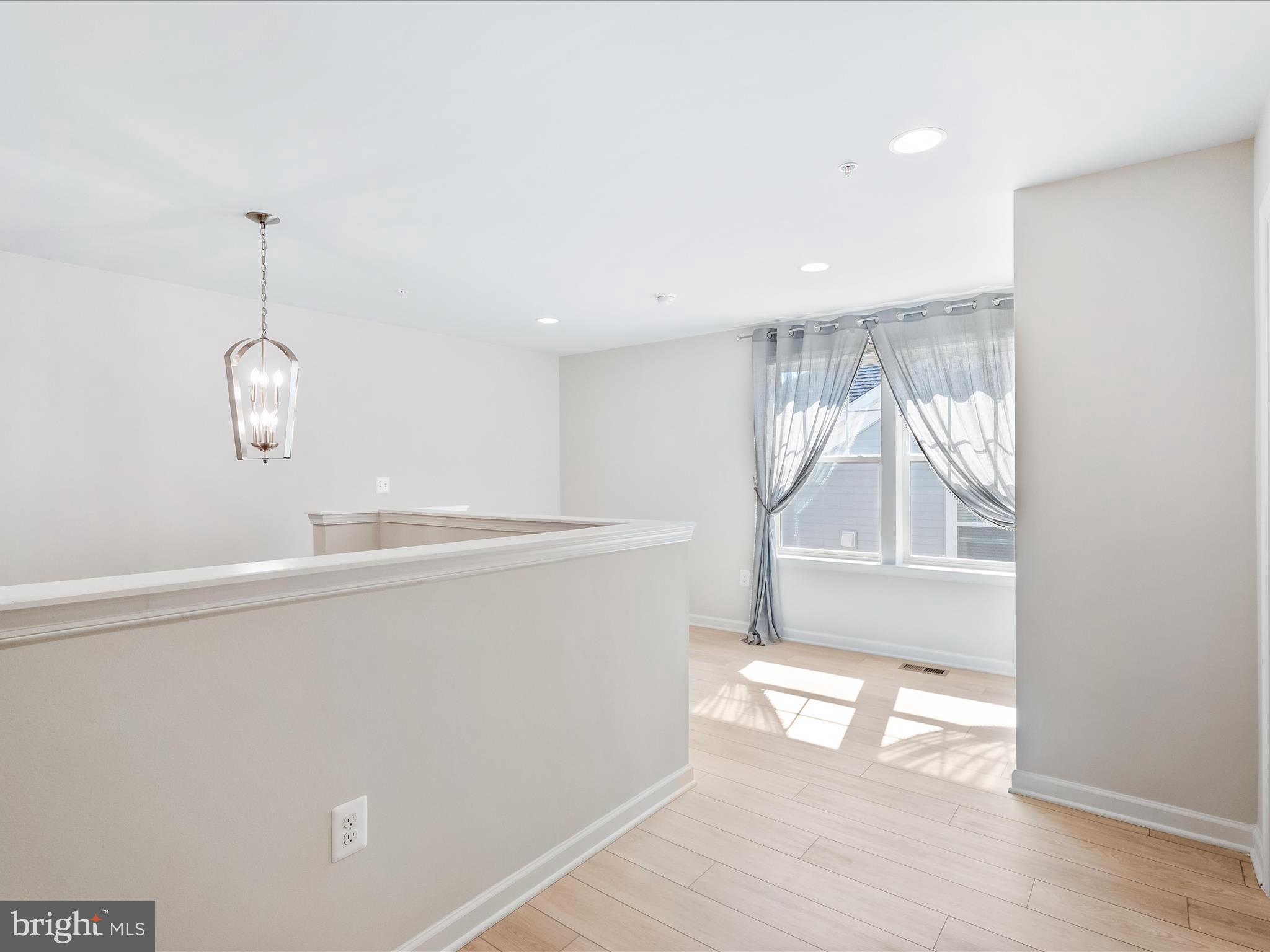 13444 Petrel Street Clarksburg, MD 20871 - Photo 23 of 45 a view of an empty room and a window