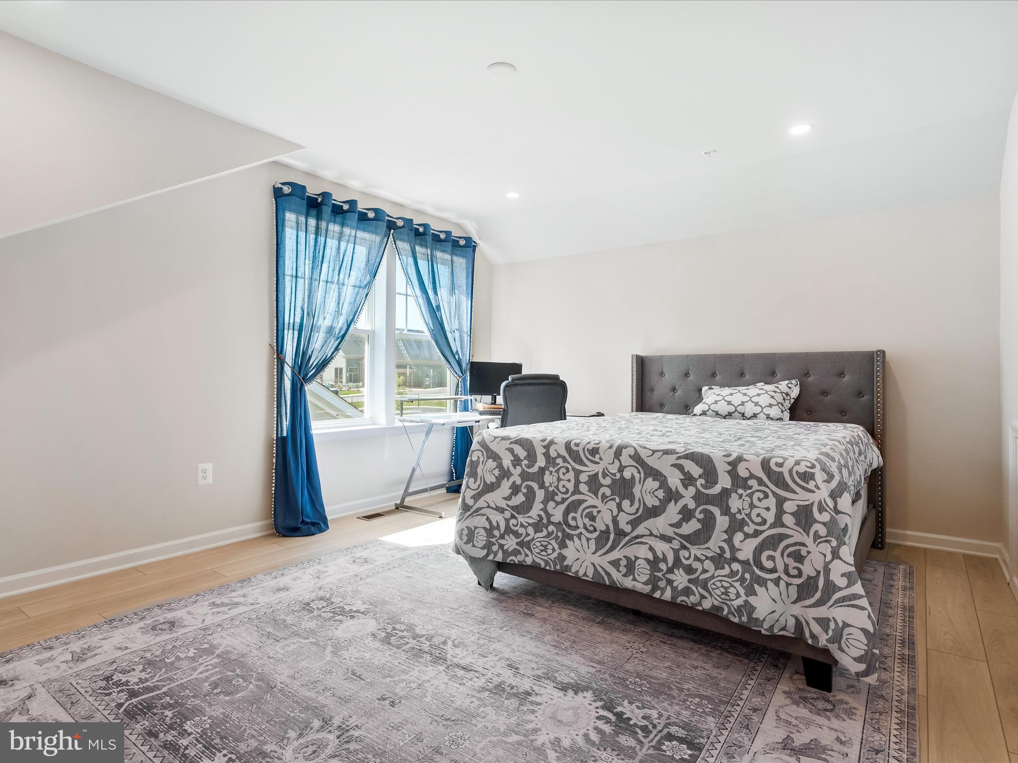 13444 Petrel Street Clarksburg, MD 20871 - Photo 25 of 45 a bedroom with a bed and a window