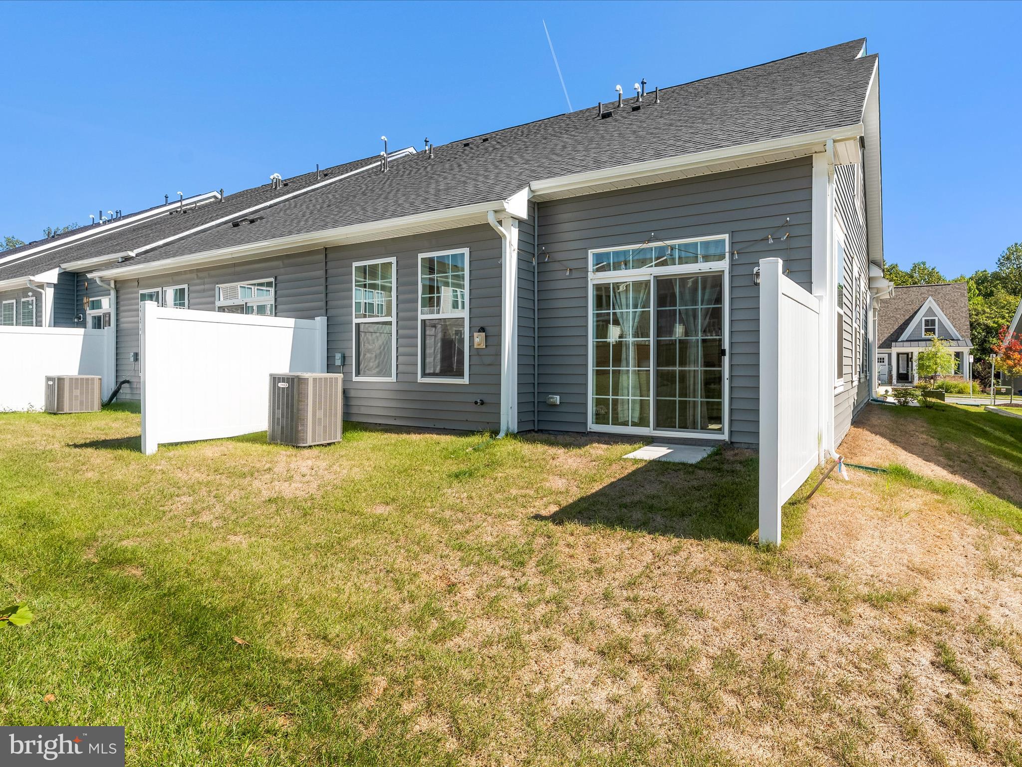 13444 Petrel Street Clarksburg, MD 20871 - Photo 29 of 45 a view of a house with backyard and porch