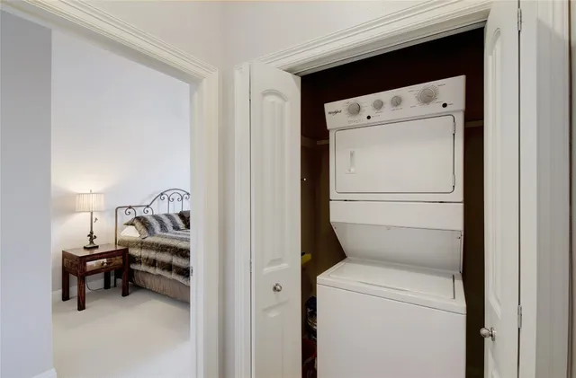 a bathroom with a shower a toilet and a sink