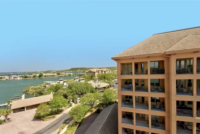 a view of a swimming pool with an ocean view