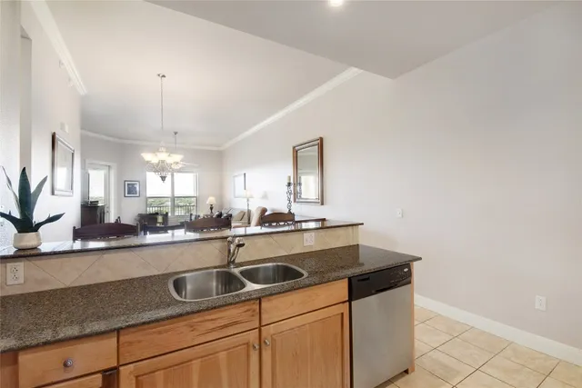 an aerial view of a city with lounge chairs