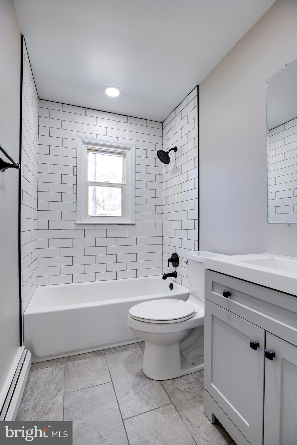 4352 Granby Road Woodbridge, VA 22193 - Photo 21 of 50 a bathroom with a sink a toilet and bathtub