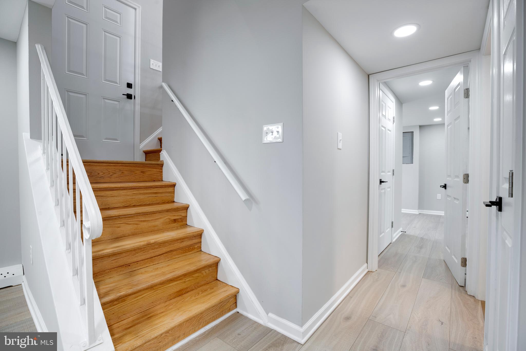 4352 Granby Road Woodbridge, VA 22193 - Photo 30 of 50 a view of a hallway with wooden floor and staircase