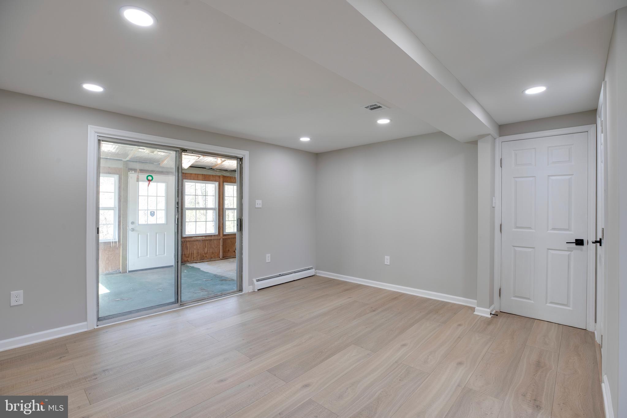 4352 Granby Road Woodbridge, VA 22193 - Photo 37 of 50 wooden floor in an empty room with a window