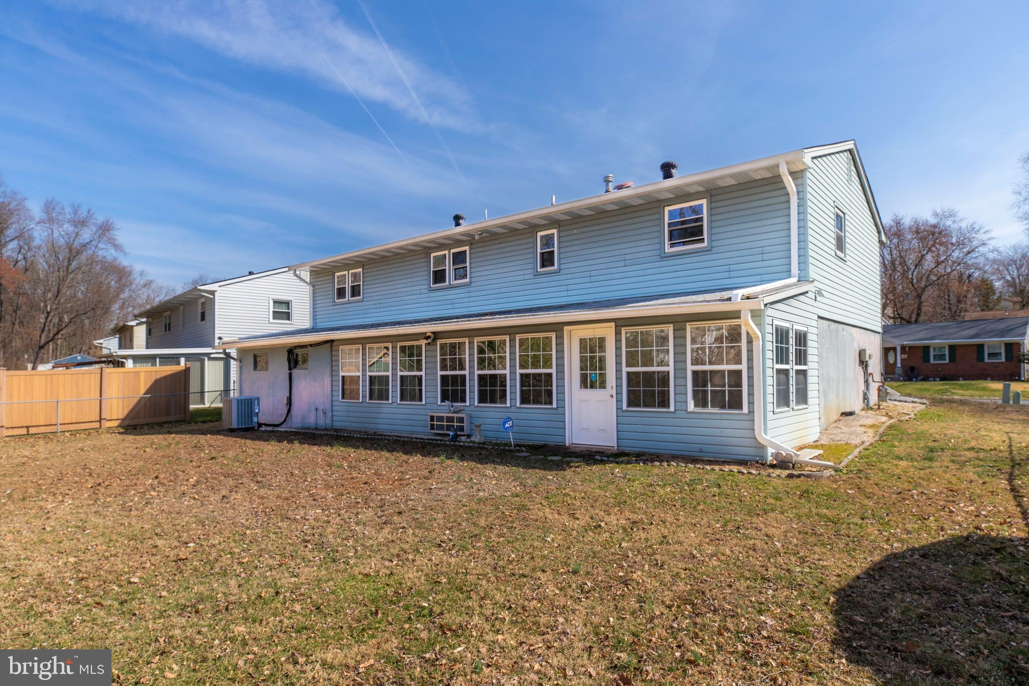 4352 Granby Road Woodbridge, VA 22193 - Photo 44 of 50 a view of a house with a big yard and large trees