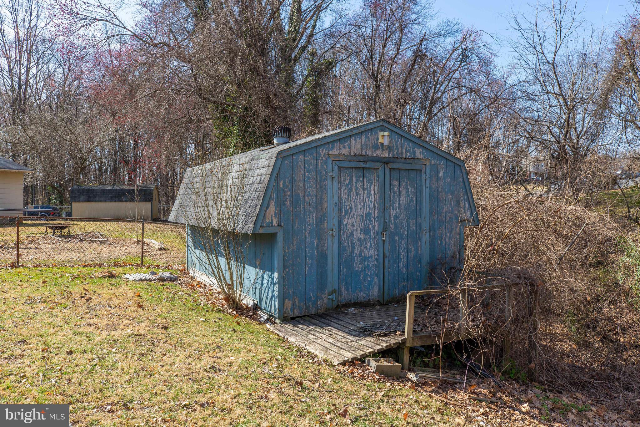 4352 Granby Road Woodbridge, VA 22193 - Photo 47 of 50 a backyard of a house with table and chairs