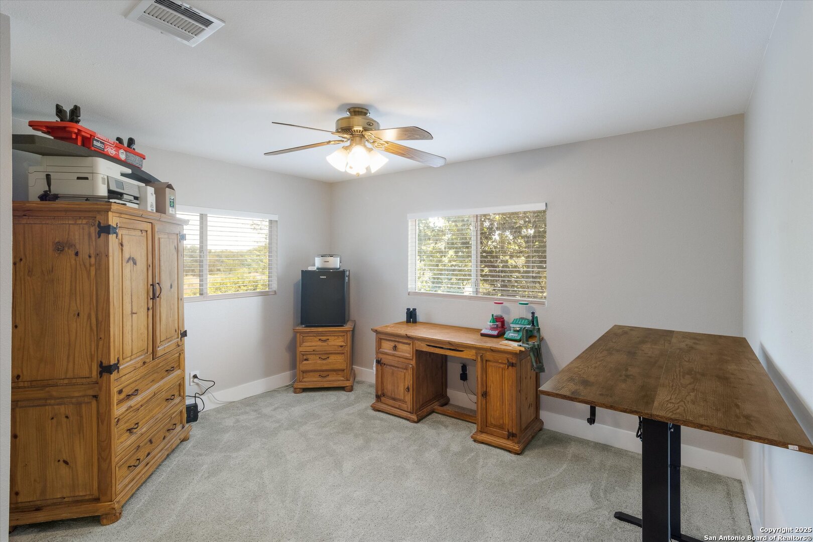 9210 Cedar Point Helotes, TX 78023 - Photo 11 of 22 a livingroom with window and a kitchen