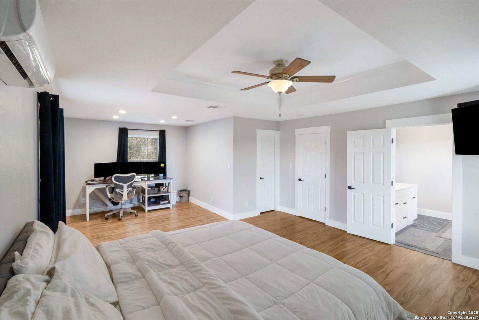 9210 Cedar Point Helotes, TX 78023 - Photo 17 of 22 a bedroom with furniture and a bed