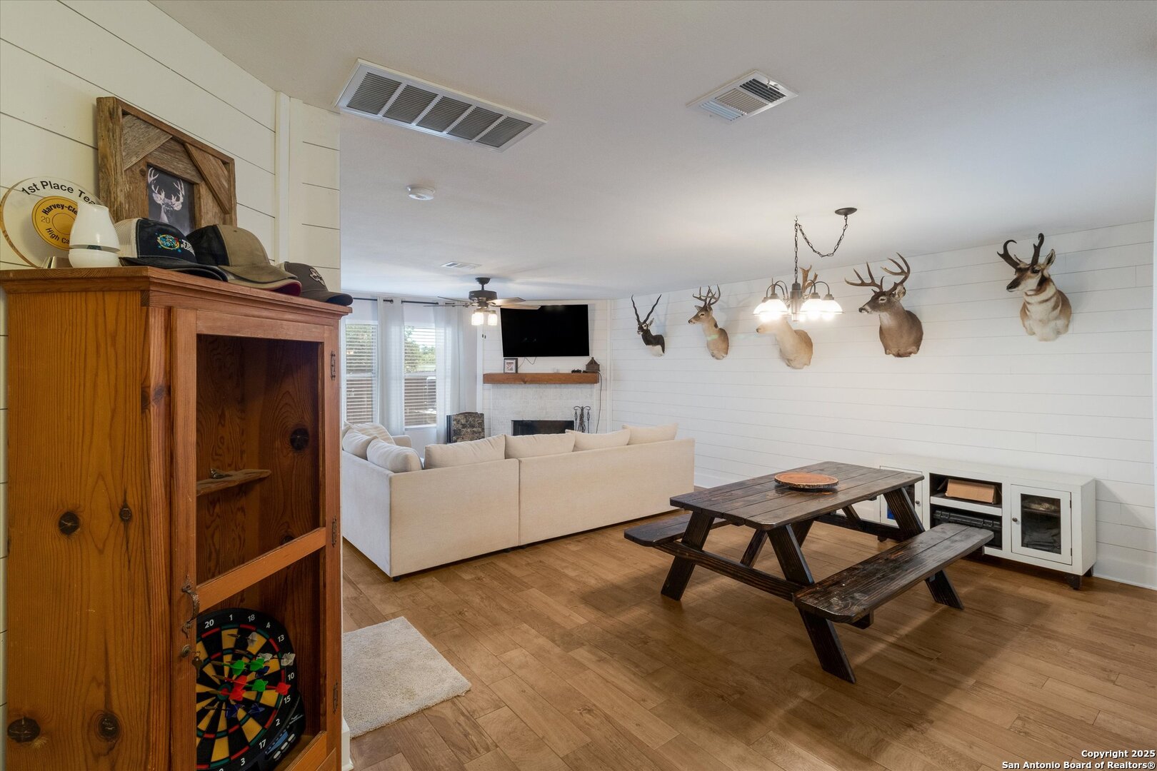 9210 Cedar Point Helotes, TX 78023 - Photo 5 of 22 a view of a livingroom with furniture and a window
