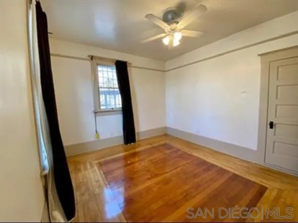 a view of an empty room and window