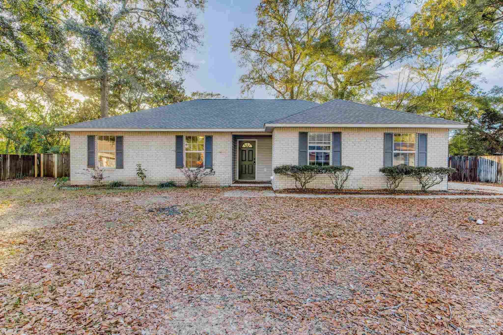 4737 Frontier Road Pace, FL 32571 - Photo 1 of 32 a view of house with a outdoor space