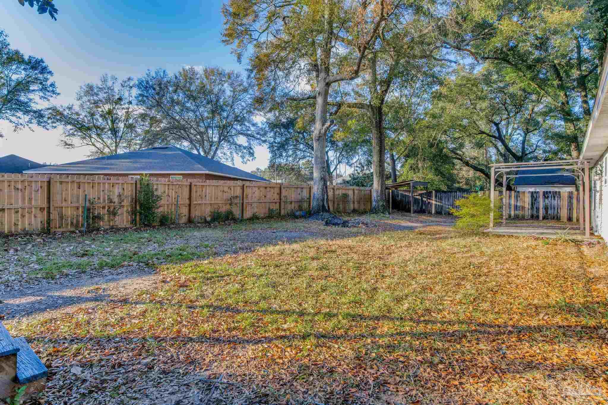 4737 Frontier Road Pace, FL 32571 - Photo 32 of 32 front view of a house with a yard