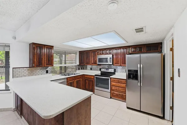 $375,000 | 3021 Mossy Oak Lane, Bedford, TX 76021