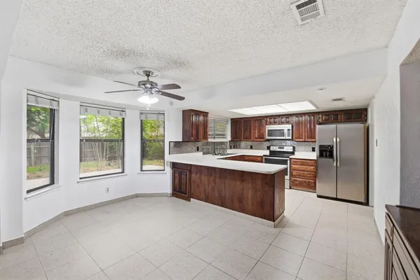 $375,000 | 3021 Mossy Oak Lane, Bedford, TX 76021