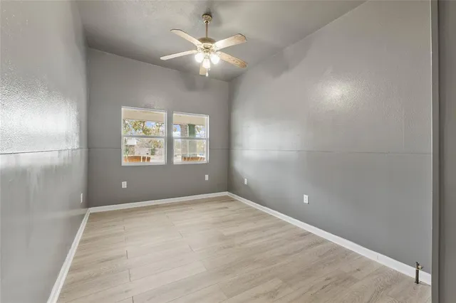 a kitchen with cabinets appliances and a sink