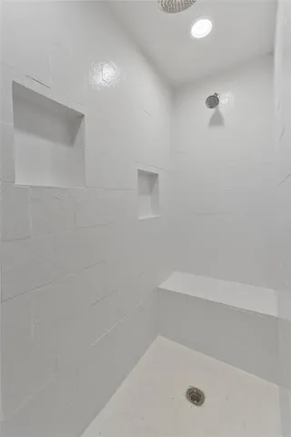 a bathroom with a sink toilet a mirror and vanity