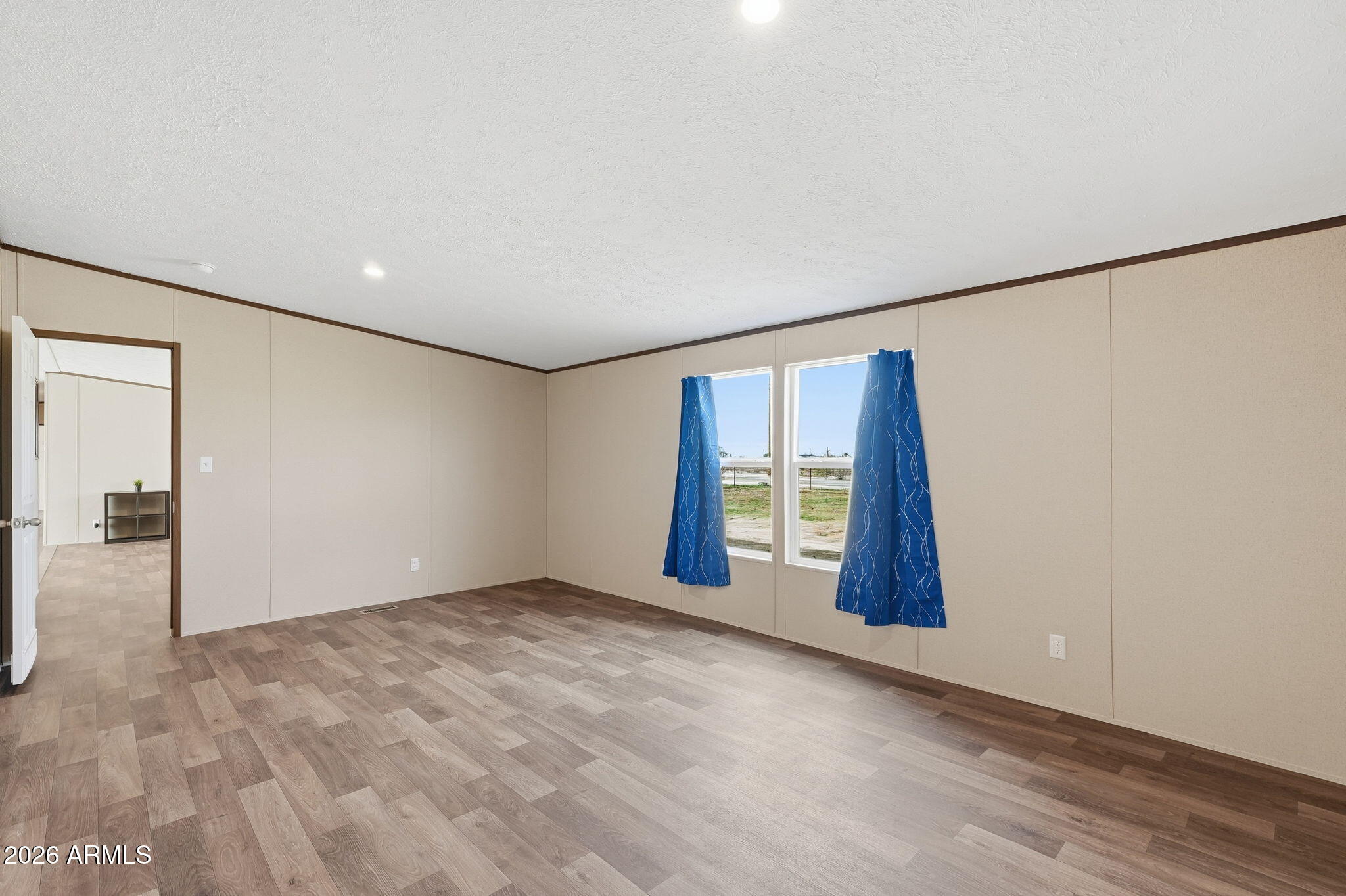 10567 North Dogwood Road Florence, AZ 85132 - Photo 13 of 28 an empty room with windows