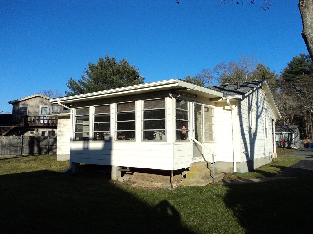 36 Longview Road New Bedford, MA 02745 - Photo 2 of 12 a front view of a house with a yard