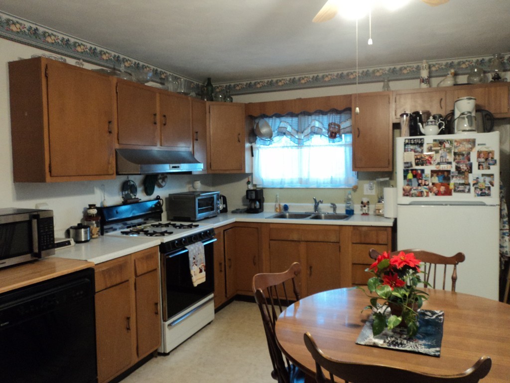 36 Longview Road New Bedford, MA 02745 - Photo 9 of 12 a kitchen with a sink cabinets and window