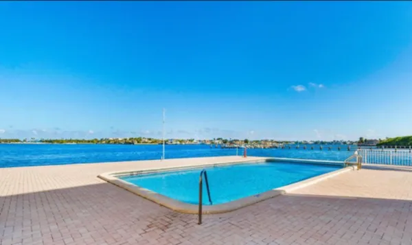 a view of a lake with a outdoor space