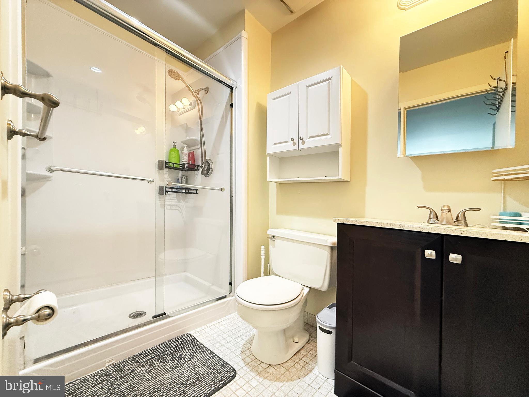 66 Old Forge Crossing, Unit 66 Devon, PA 19333 - Photo 16 of 16 a bathroom with a shower toilet and sink