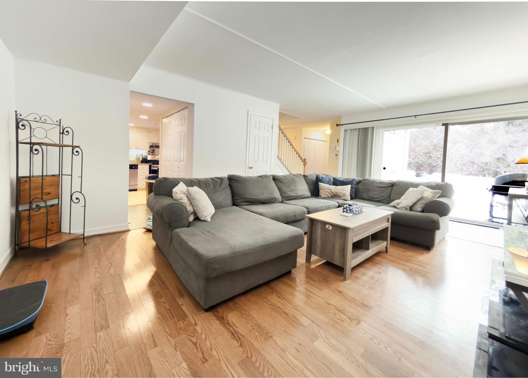 66 Old Forge Crossing, Unit 66 Devon, PA 19333 - Photo 5 of 16 a living room with furniture and a large window