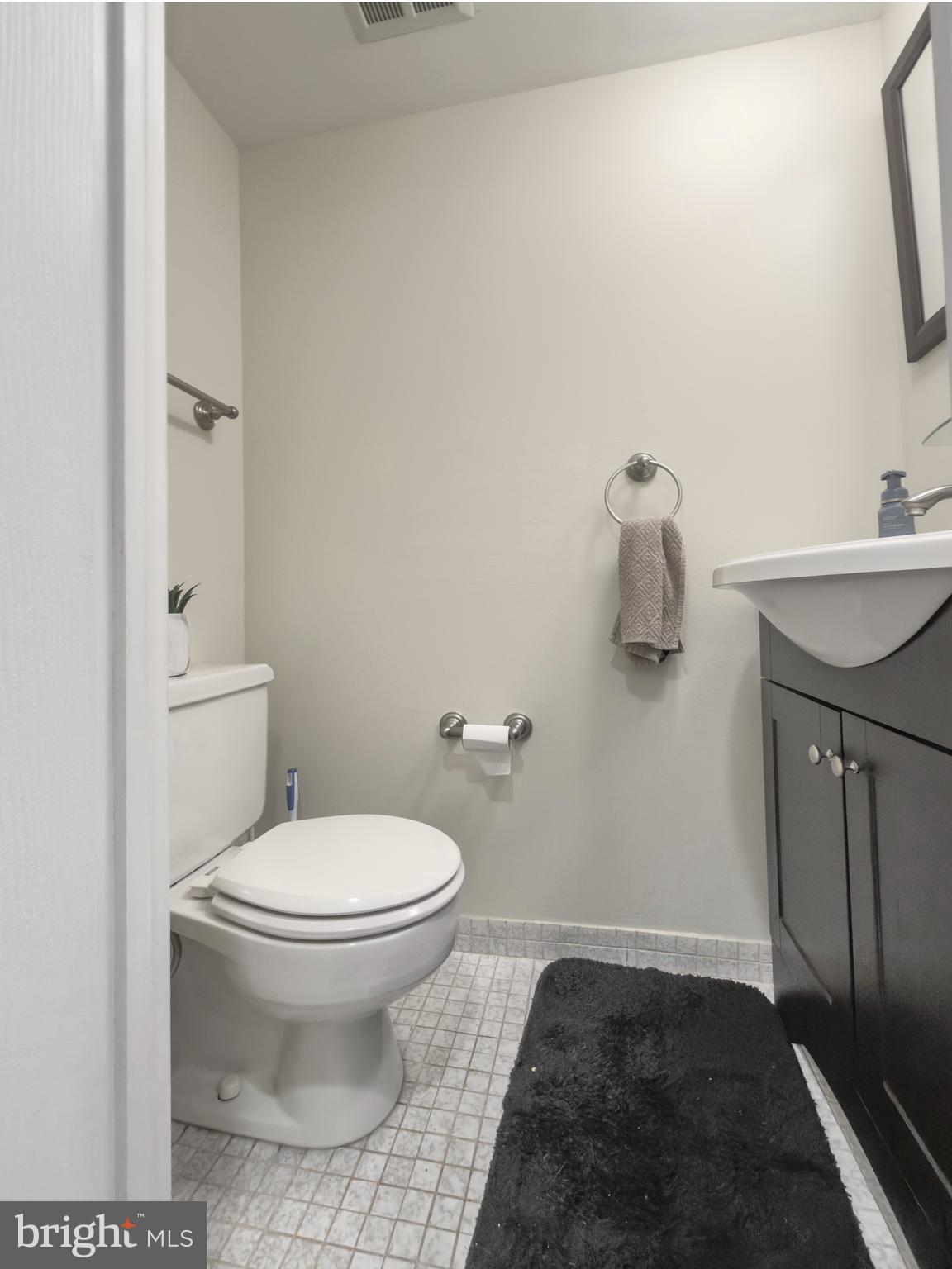 66 Old Forge Crossing, Unit 66 Devon, PA 19333 - Photo 7 of 16 a bathroom with a sink and a toilet