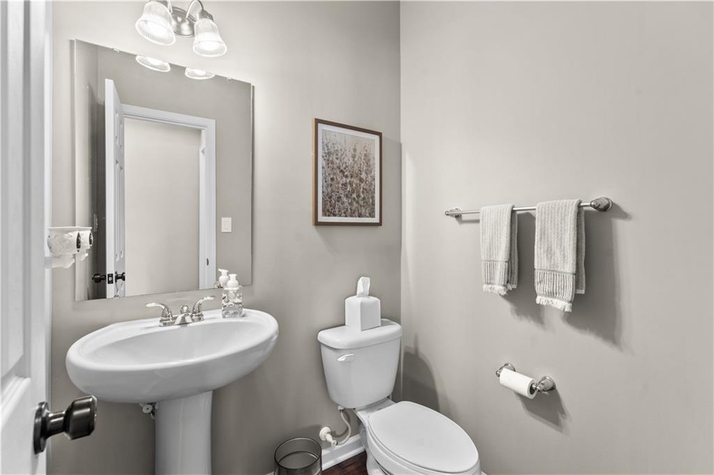 159 Rylie Drive Harmony, PA 16037 - Photo 19 of 36 a bathroom with a toilet sink and mirror