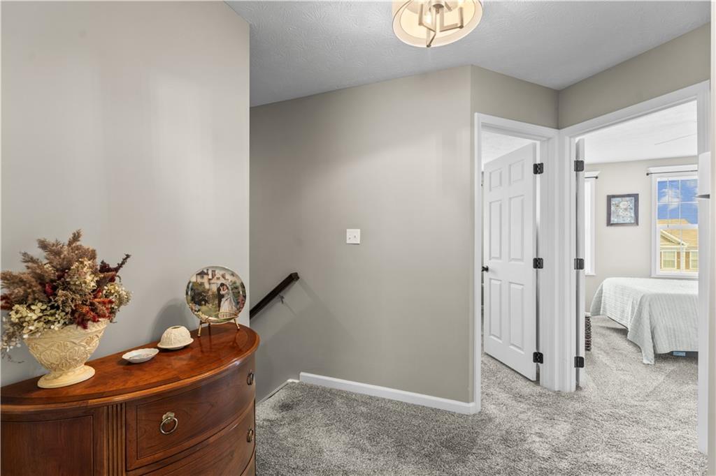 159 Rylie Drive Harmony, PA 16037 - Photo 22 of 36 a room with furniture and flowerpot