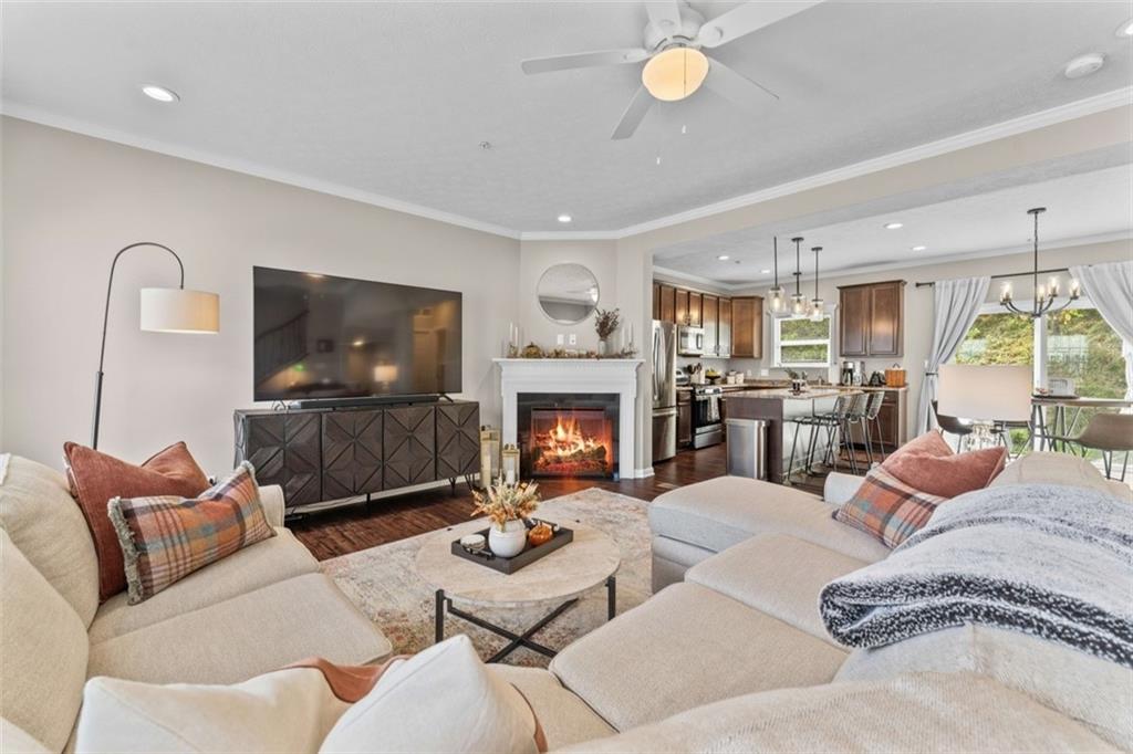 159 Rylie Drive Harmony, PA 16037 - Photo 6 of 36 a living room with furniture and a fireplace