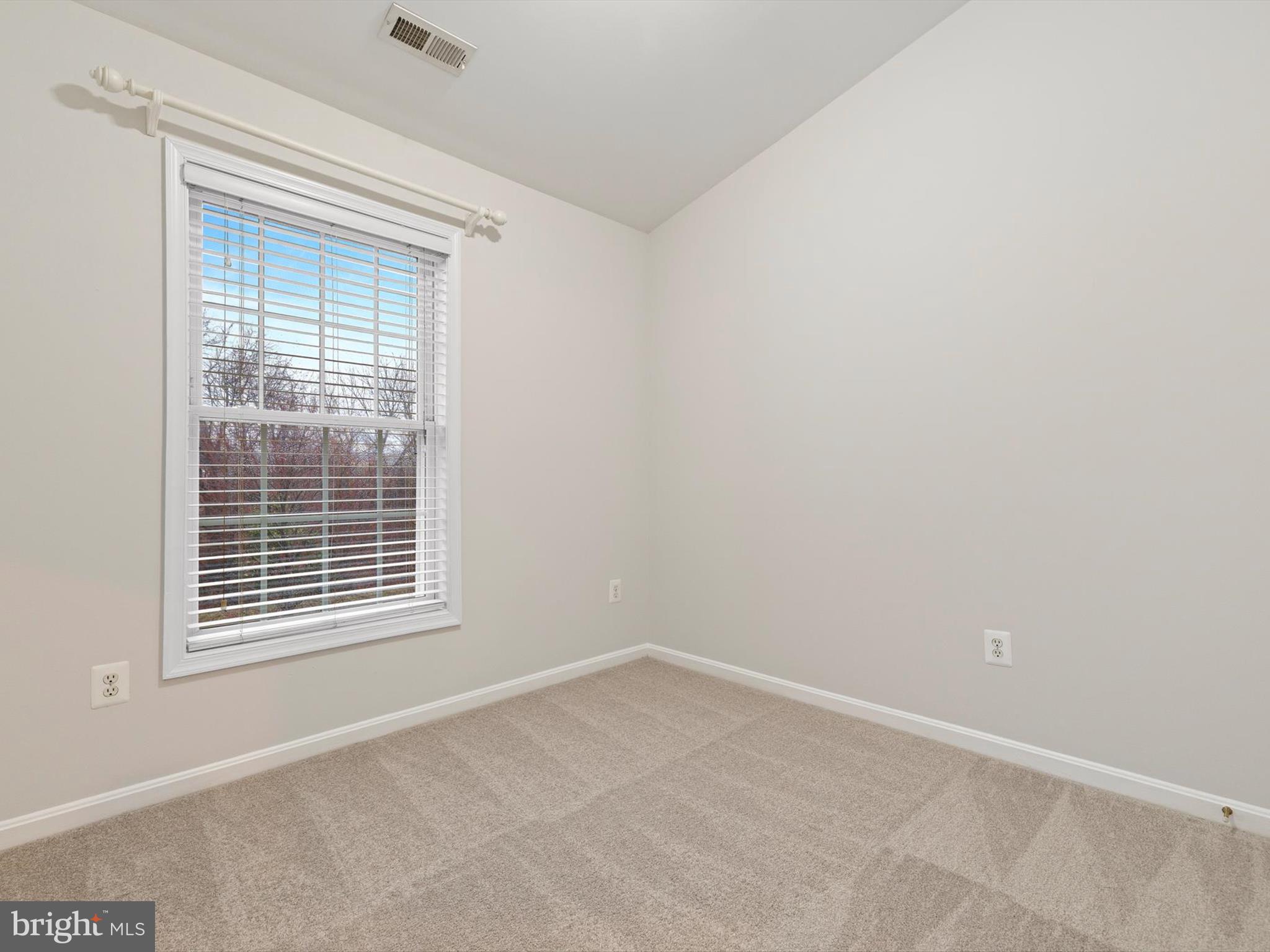 2807 Cornet Court Silver Spring, MD 20904 - Photo 30 of 44 a view of an empty room with a window