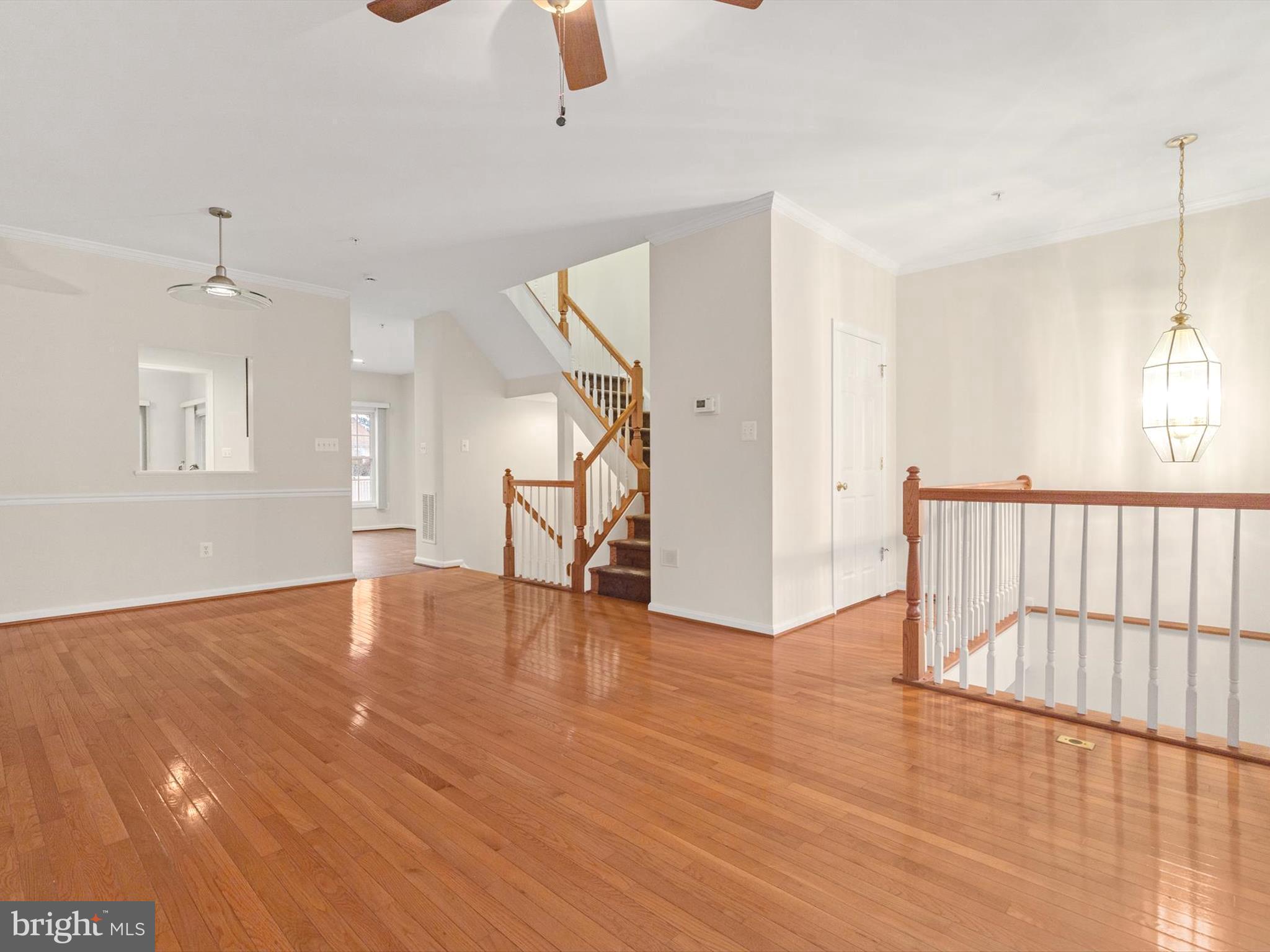 2807 Cornet Court Silver Spring, MD 20904 - Photo 7 of 44 a view of an empty room with wooden floor and a window
