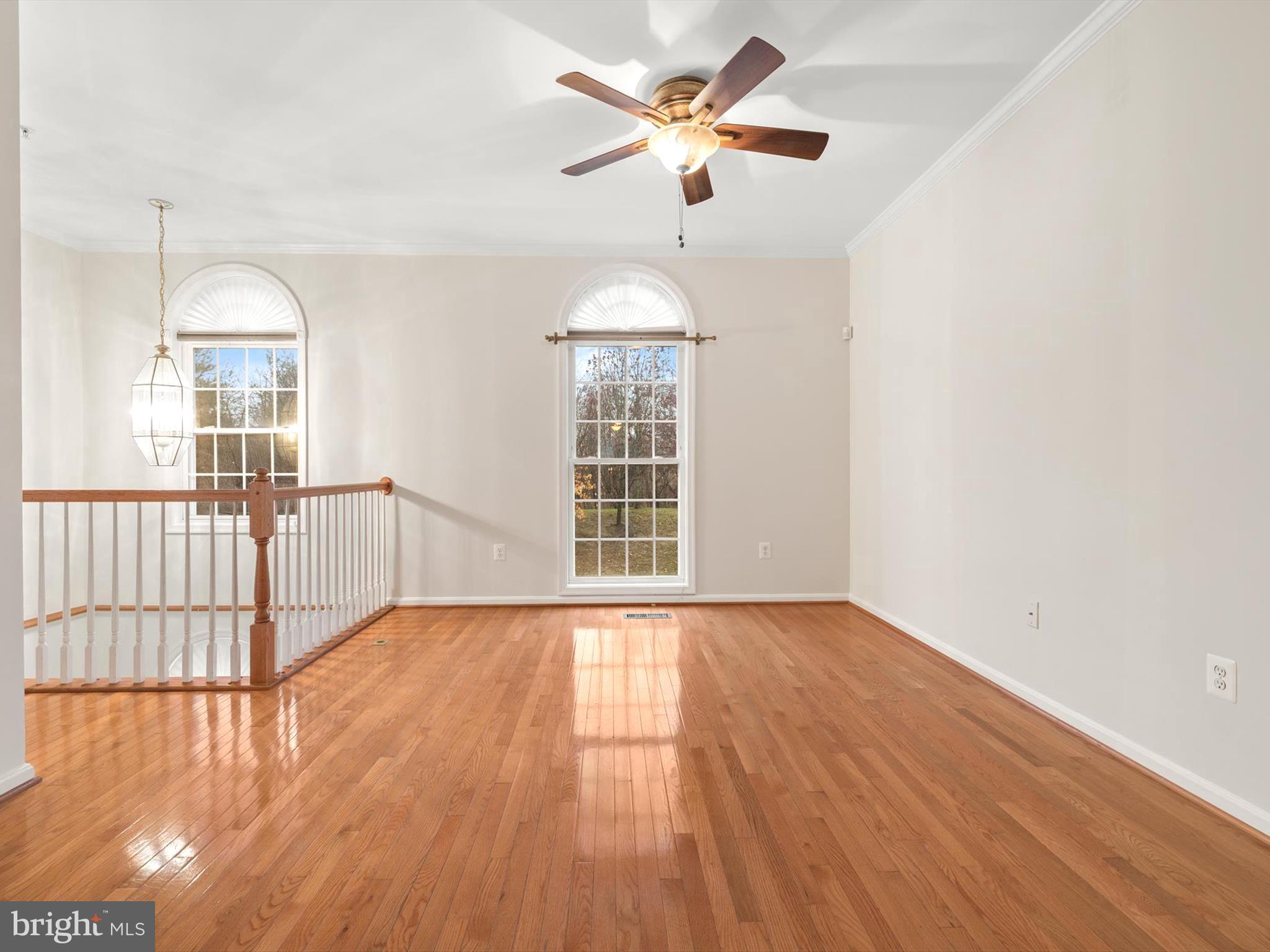 2807 Cornet Court Silver Spring, MD 20904 - Photo 8 of 44 a view of an empty room with wooden floor and a window