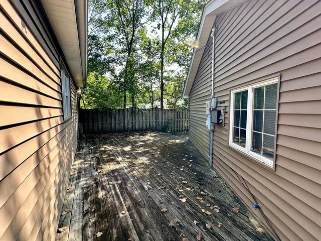 a view of a house with a large window
