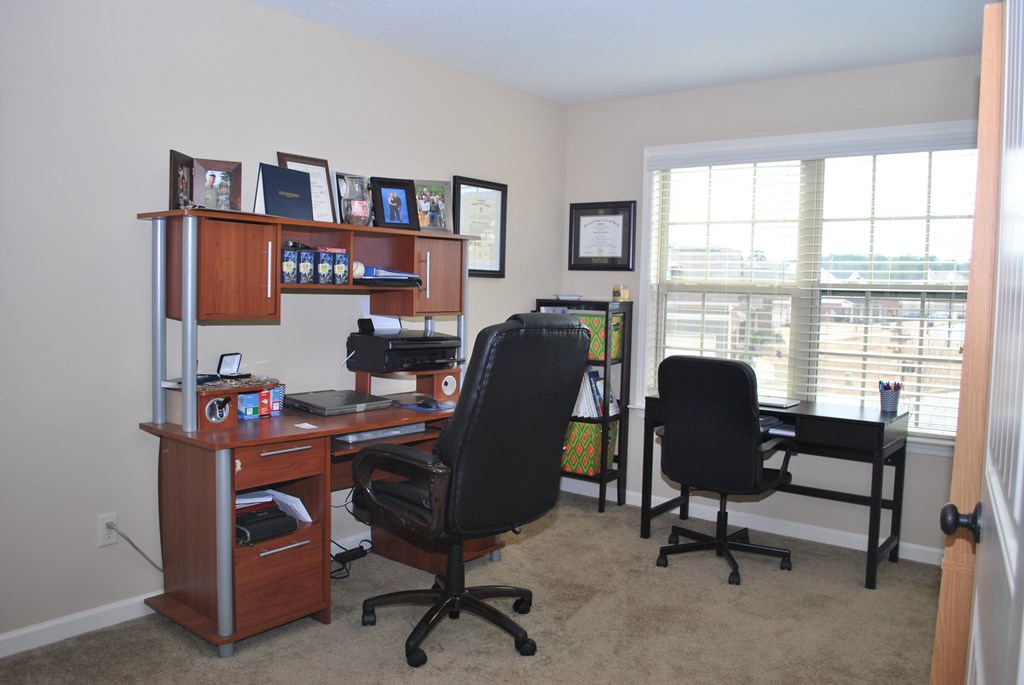 9536 English Ivy Court Fortson, GA 31808 - Photo 19 of 22 a view of a workspace with furniture and a window