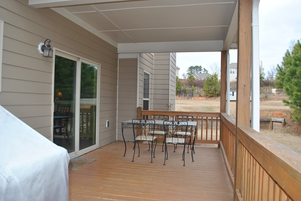 9536 English Ivy Court Fortson, GA 31808 - Photo 20 of 22 a dining room with furniture and large windows
