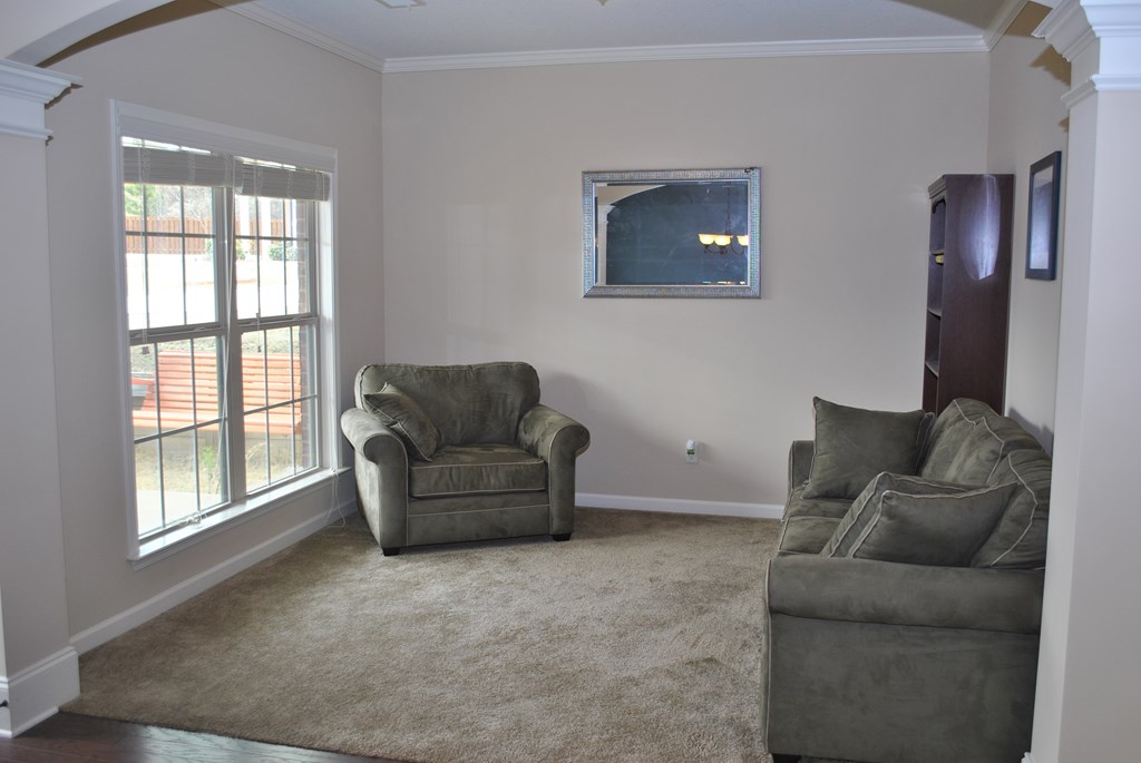 9536 English Ivy Court Fortson, GA 31808 - Photo 4 of 22 a living room with furniture and a window