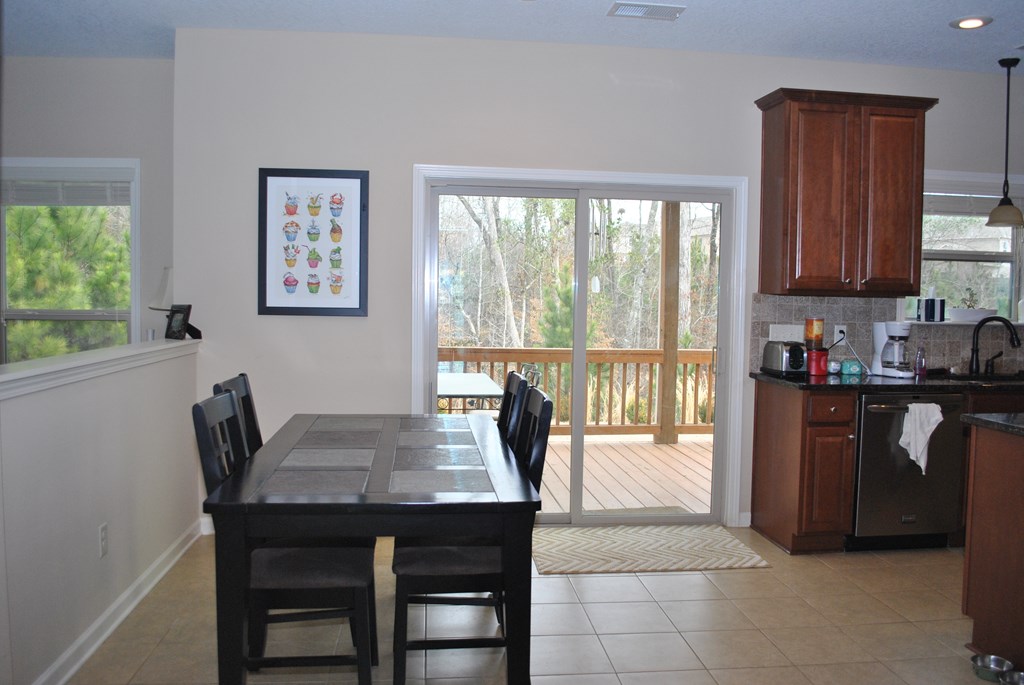 9536 English Ivy Court Fortson, GA 31808 - Photo 8 of 22 a dining room with furniture and window