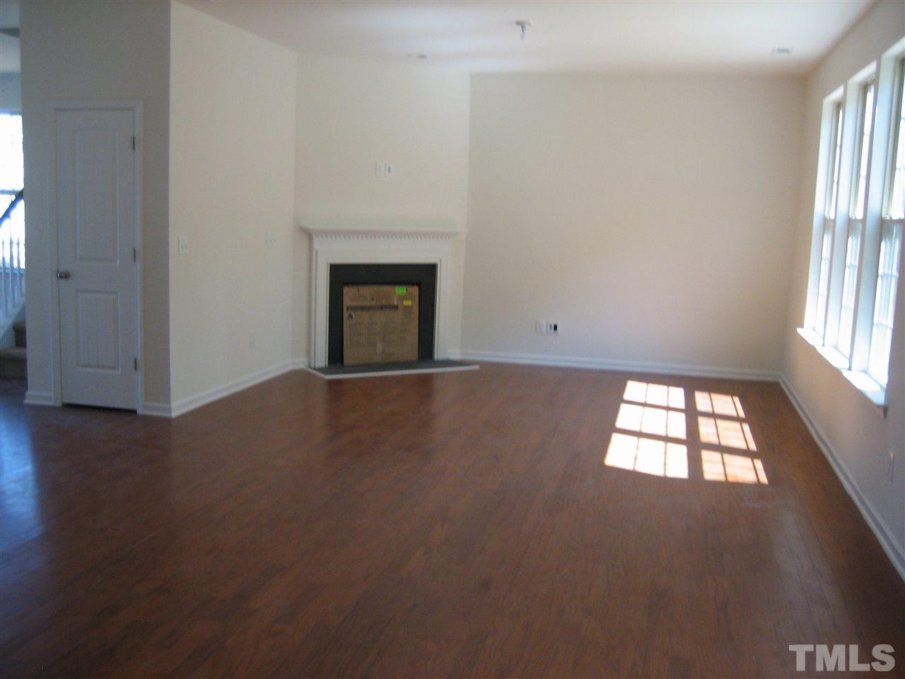 2436 Everstone Road Wake Forest, NC 27587 - Photo 4 of 25 Family room off Breakfast and Kitchen. Hardwoods and corner Fireplace