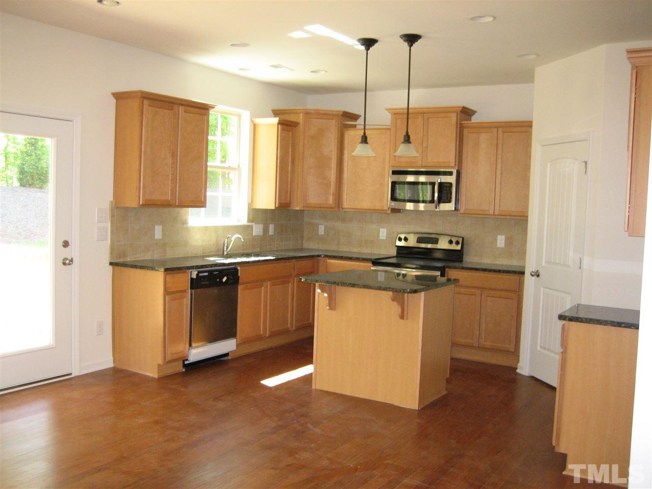 2436 Everstone Road Wake Forest, NC 27587 - Photo 7 of 25 Open Kitchen to Breakfast, Granite Cabinets, Gas, Stainless