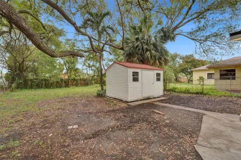 a backyard of a house with lots of green space