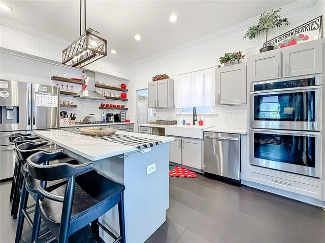 a view of game room with window and furniture