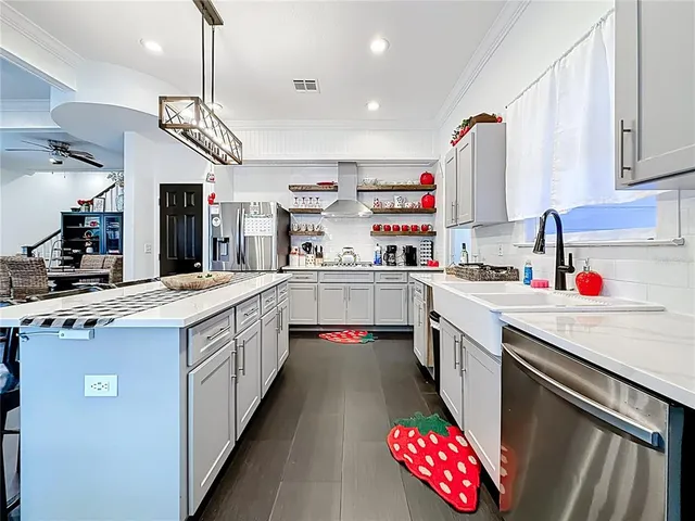 a view of a chairs and table in the patio