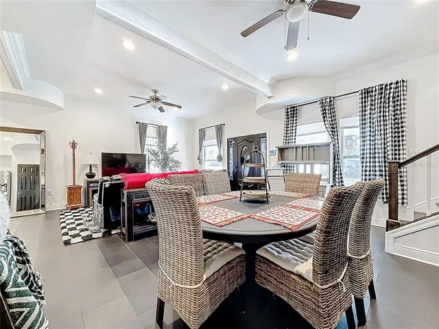 a bathroom with a granite countertop sink a toilet and a mirror